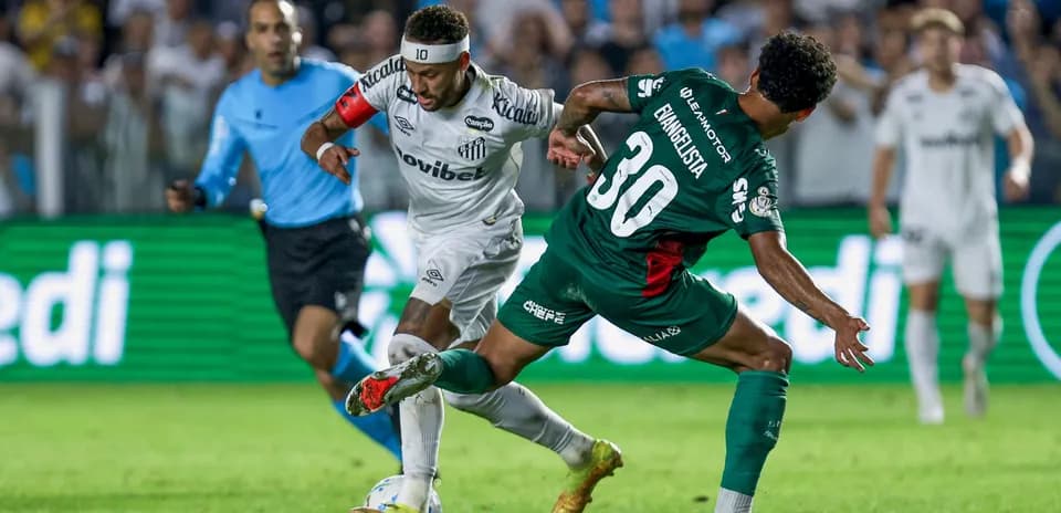 Neymar dribbling past defender during football match