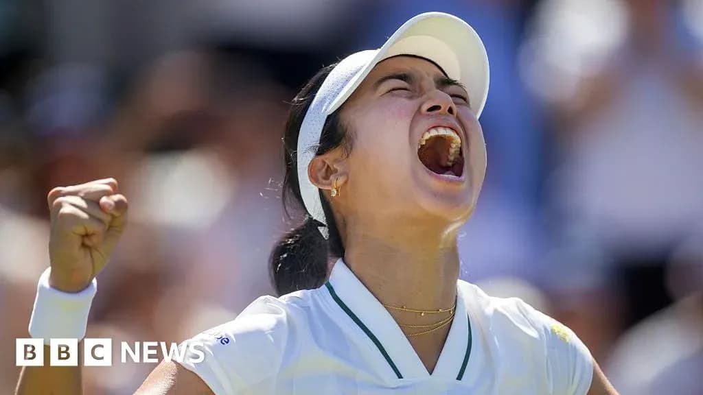 Tennis player celebrating victory with a fist pump