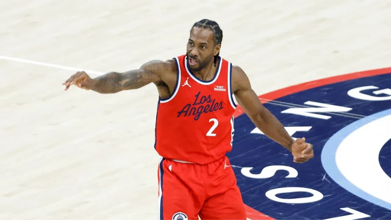 Basketball player signaling during game on court