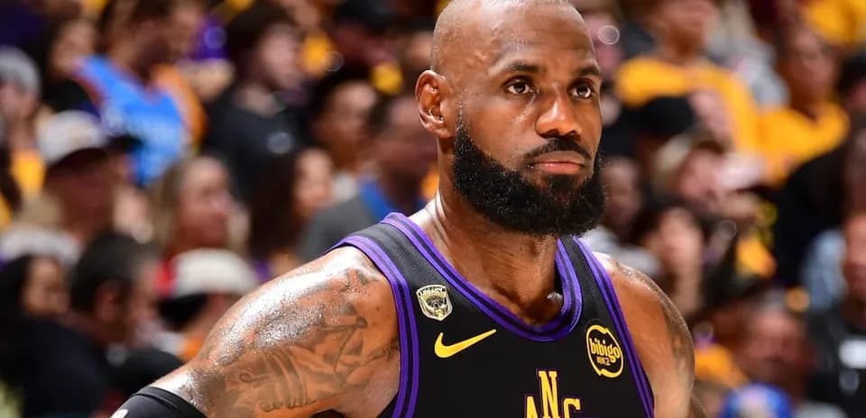 LeBron James during NBA game with fans in background