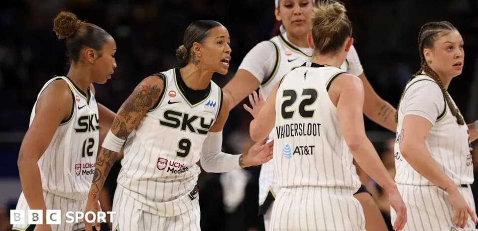 Chicago Sky players discussing strategy during game
