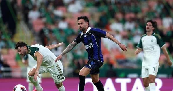 Two players contesting the ball during a match