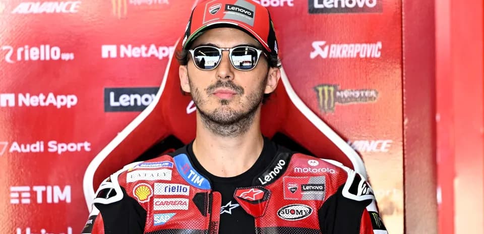 Rider wearing sunglasses in pit area