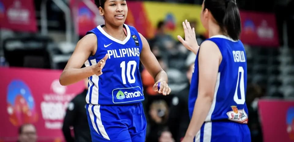 Filipinas players celebrating during basketball match