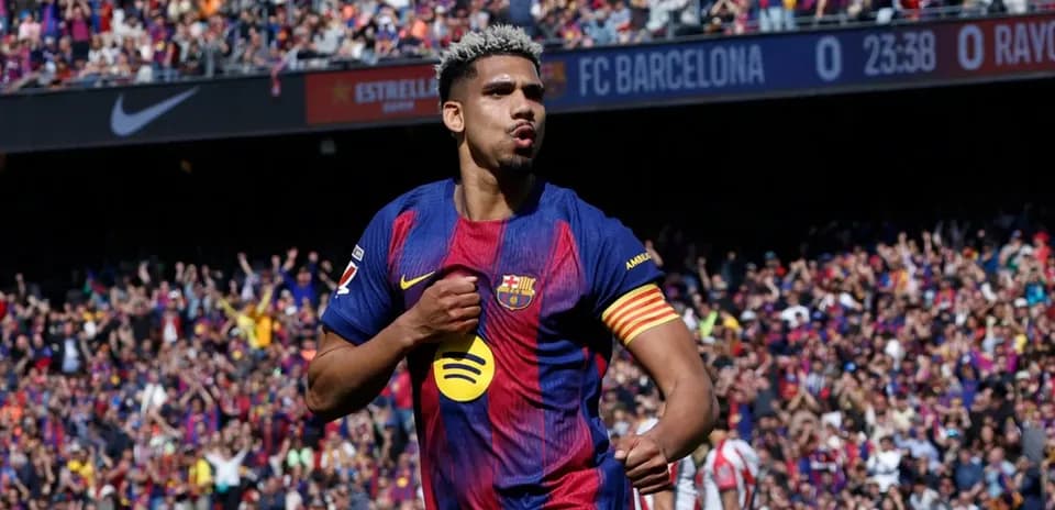 Barcelona player celebrating a goal at Camp Nou