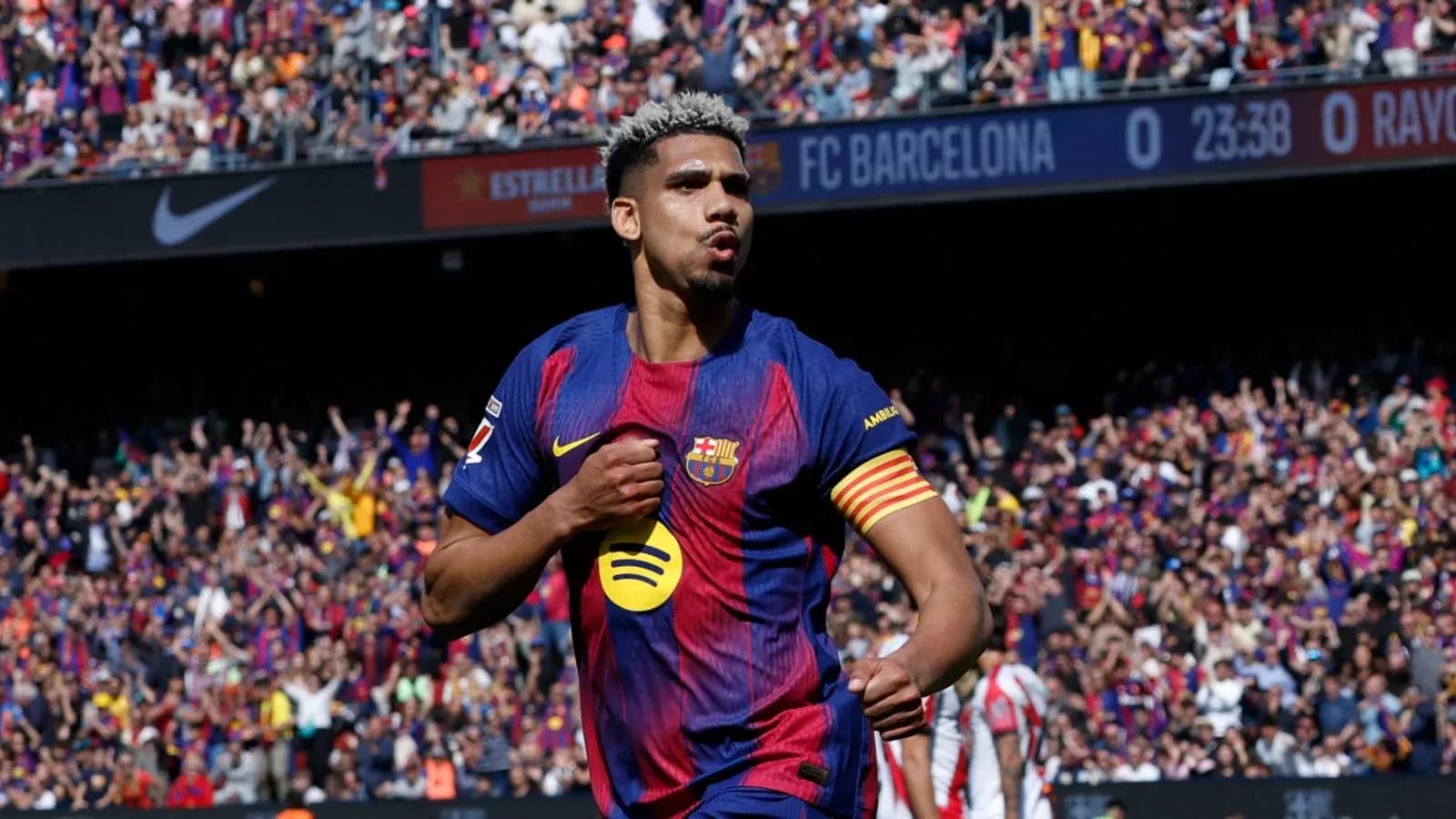 Barcelona player celebrating a goal at Camp Nou