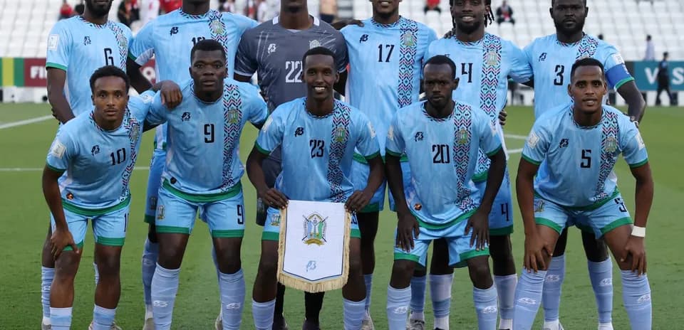 Football team posing for group photo before match