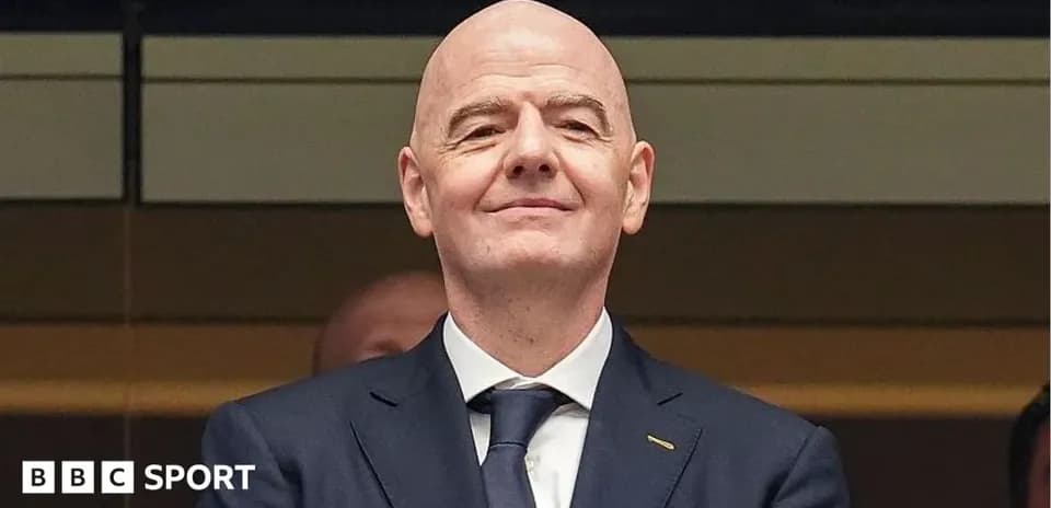 FIFA president attending an event, smiling