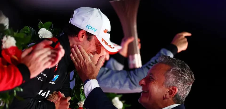 Podium celebration with winner and team representative