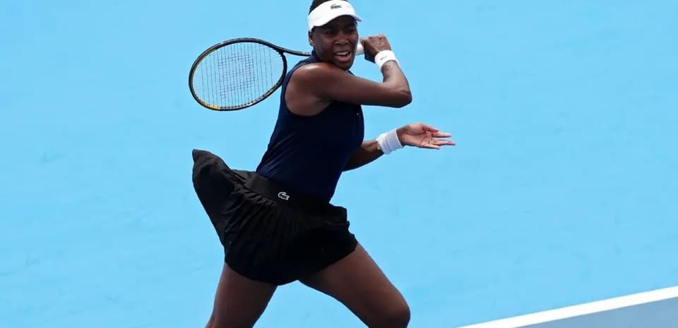 Tennis player hitting a forehand on court