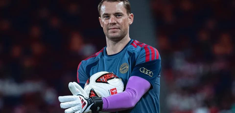 Goalkeeper holding ball before match kickoff