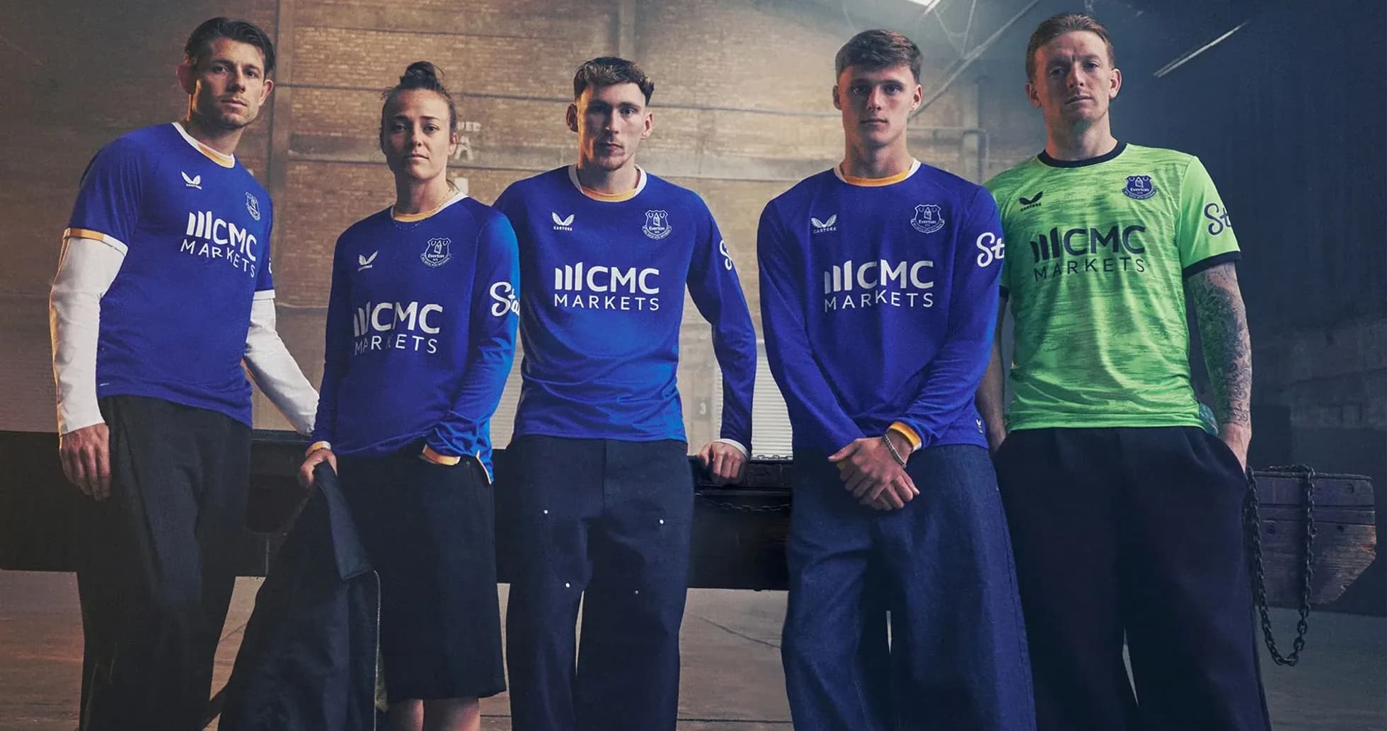 Everton players posing in team kits indoors