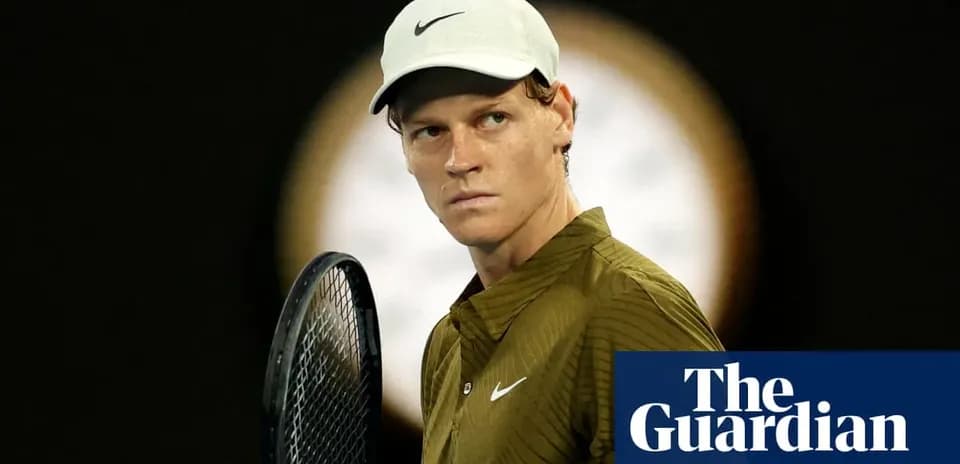 Tennis player preparing for a match with racket
