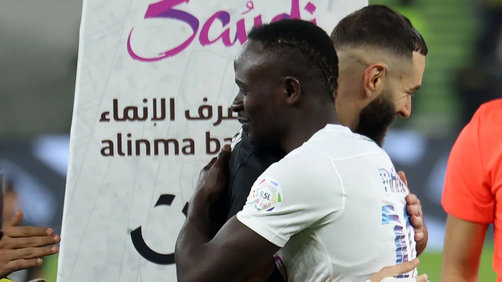 Two players embracing after a match