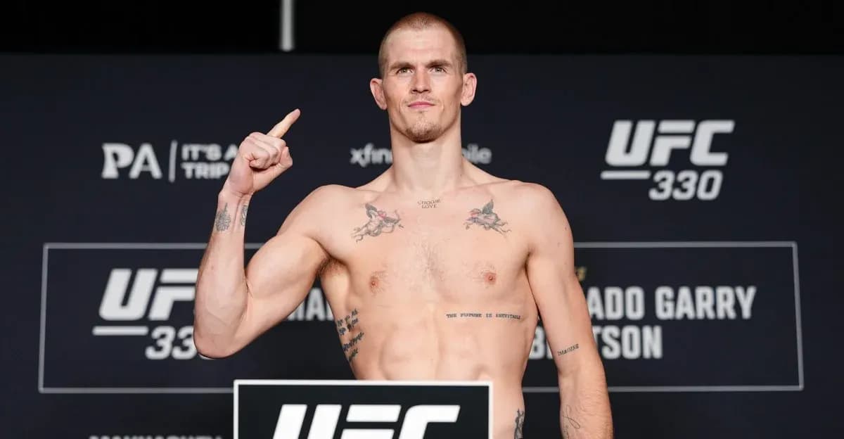 UFC 330 weigh-in, fighter posing with raised finger