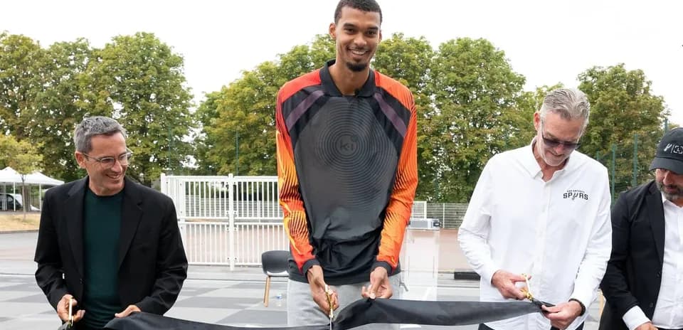 Ceremony for opening new basketball court with officials