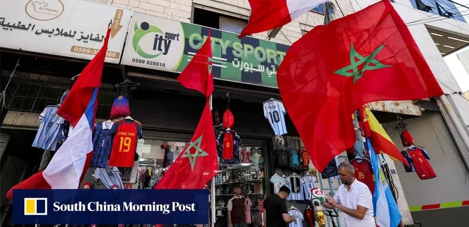 Flags and football jerseys displayed outside sports shop
