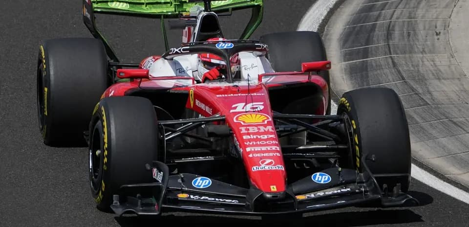 Ferrari car racing on track during event