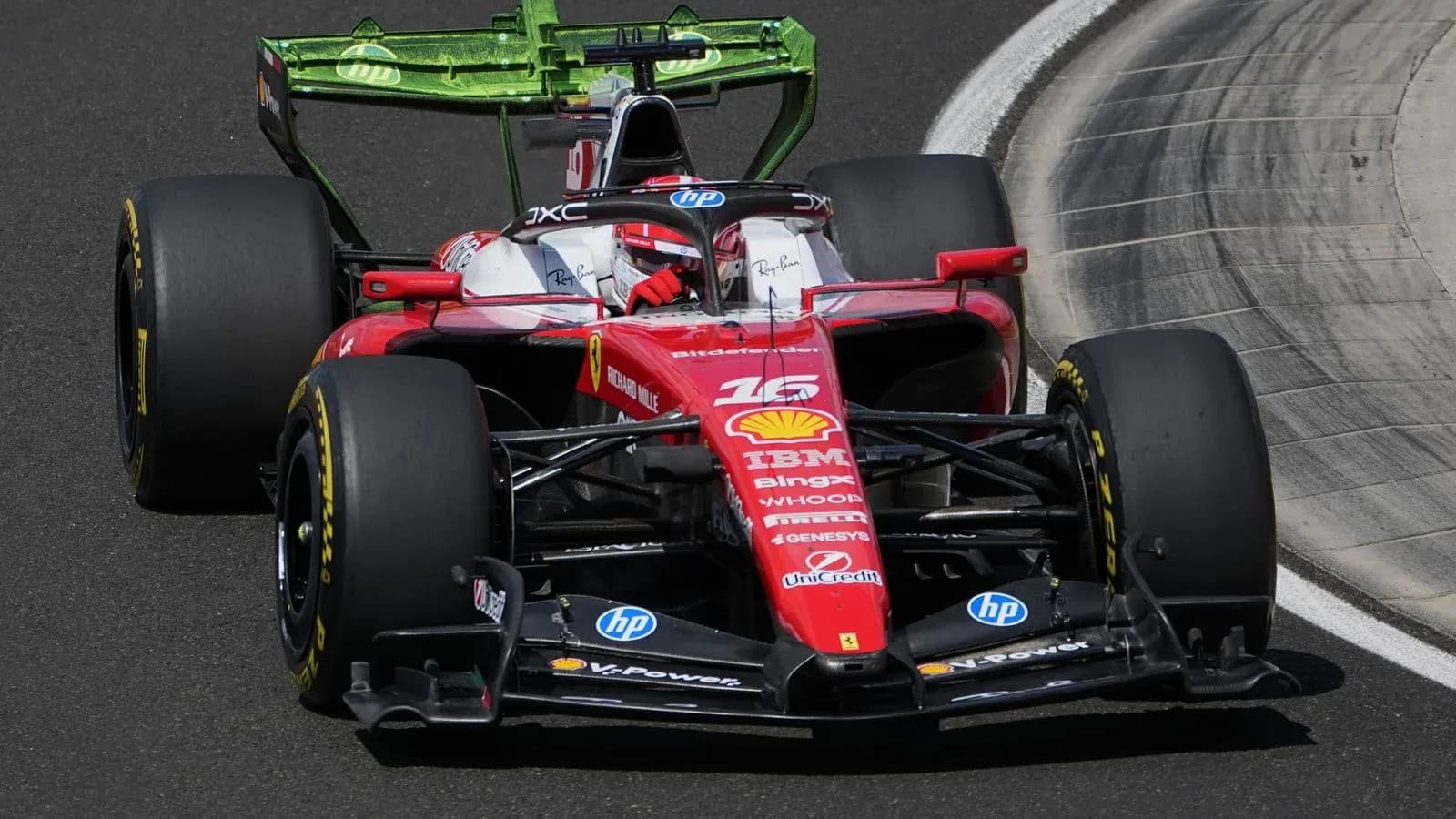 Ferrari car racing on track during event