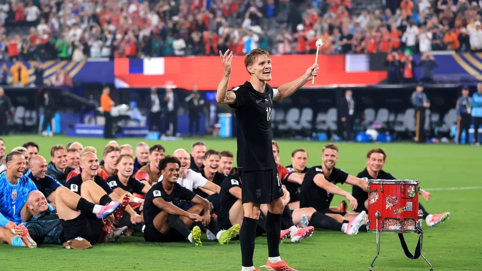 Player celebrating with teammates after match victory