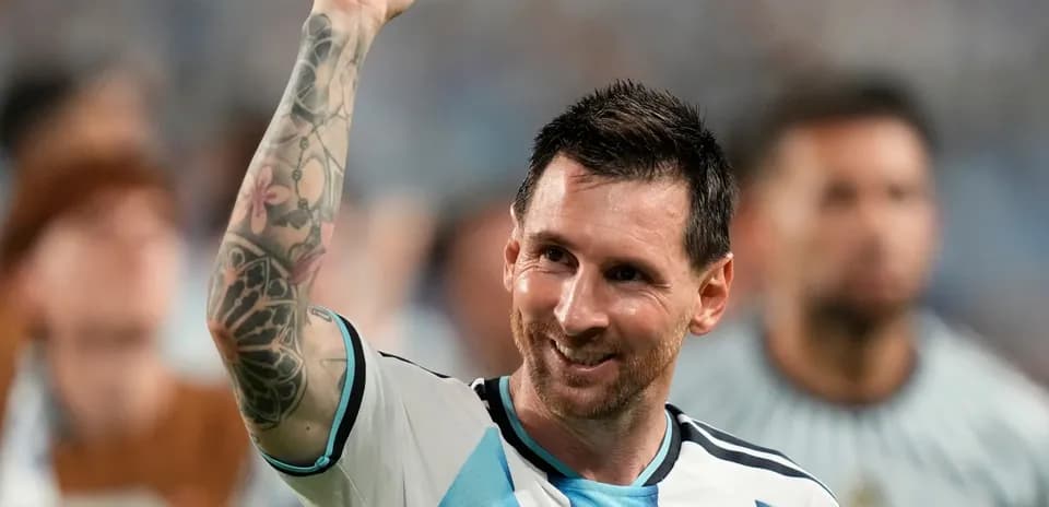 Messi celebrating with raised fist after match