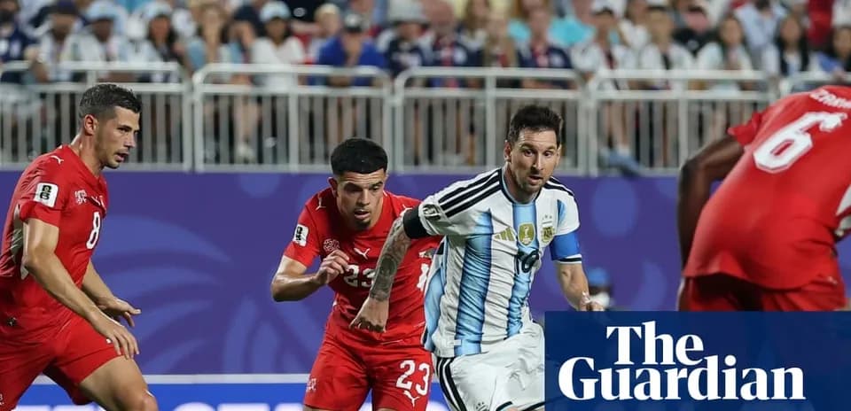 Lionel Messi dribbling past defenders during match