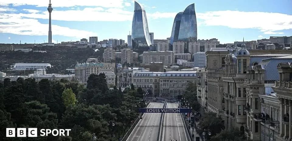 Formula 1 car racing on city street in Baku