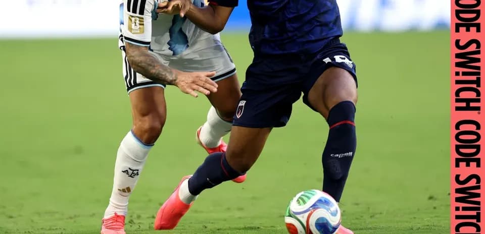 Two players challenging for the ball during match