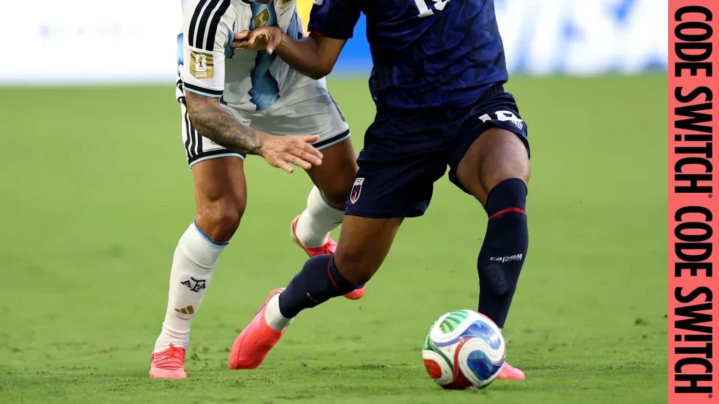 Two players challenging for the ball during match