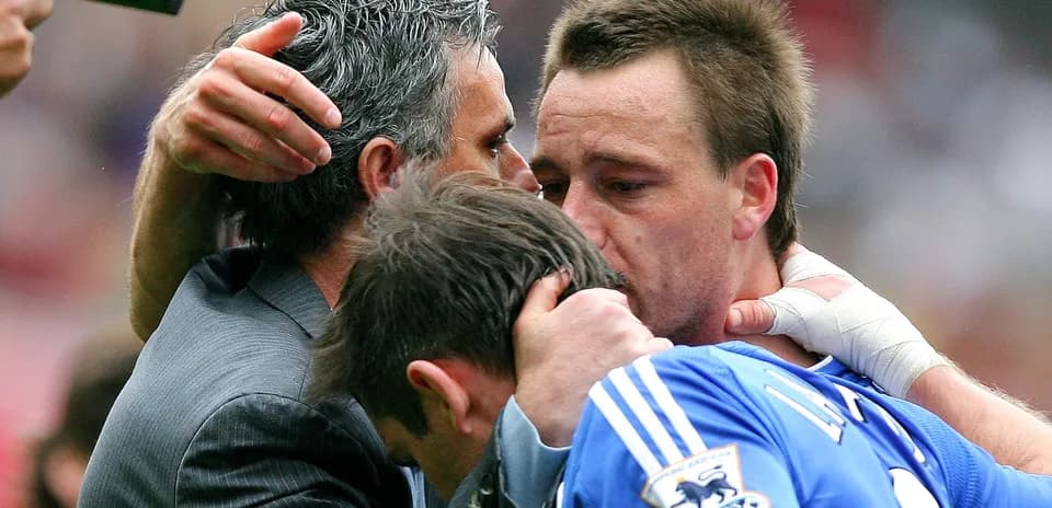 Coaches and players embracing after match conclusion