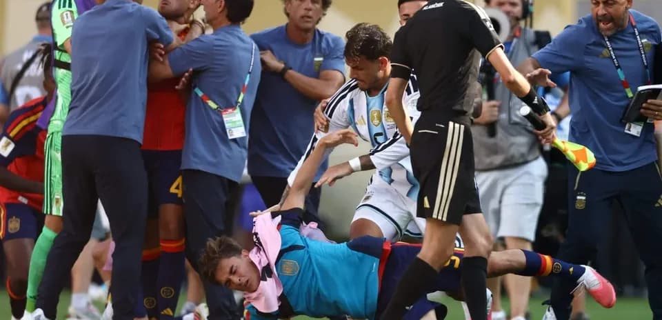 Players and staff involved in a scuffle on the field