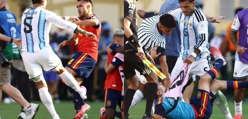 Players clashing during heated football match confrontation