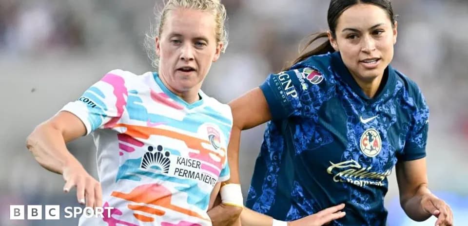 Two female players competing for the ball