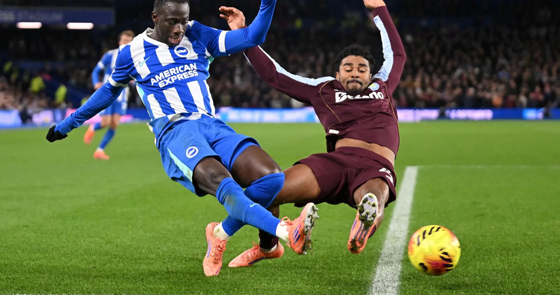 Two players colliding during a football match