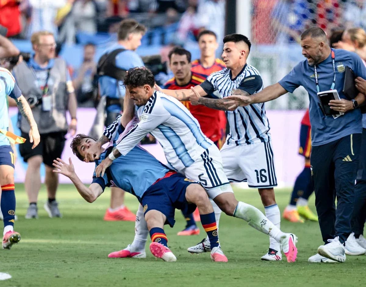 Players clashing during a heated moment in match