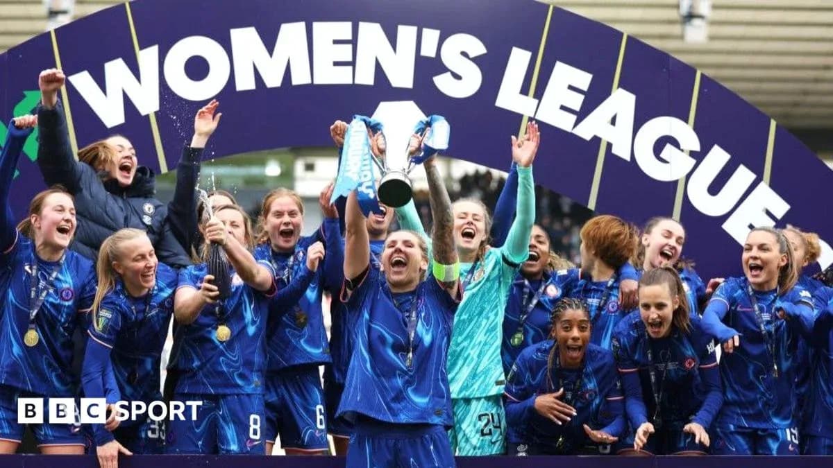 Chelsea Women celebrating victory with trophy