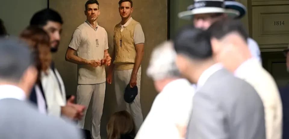 Portrait of two cricketers with crowd in foreground