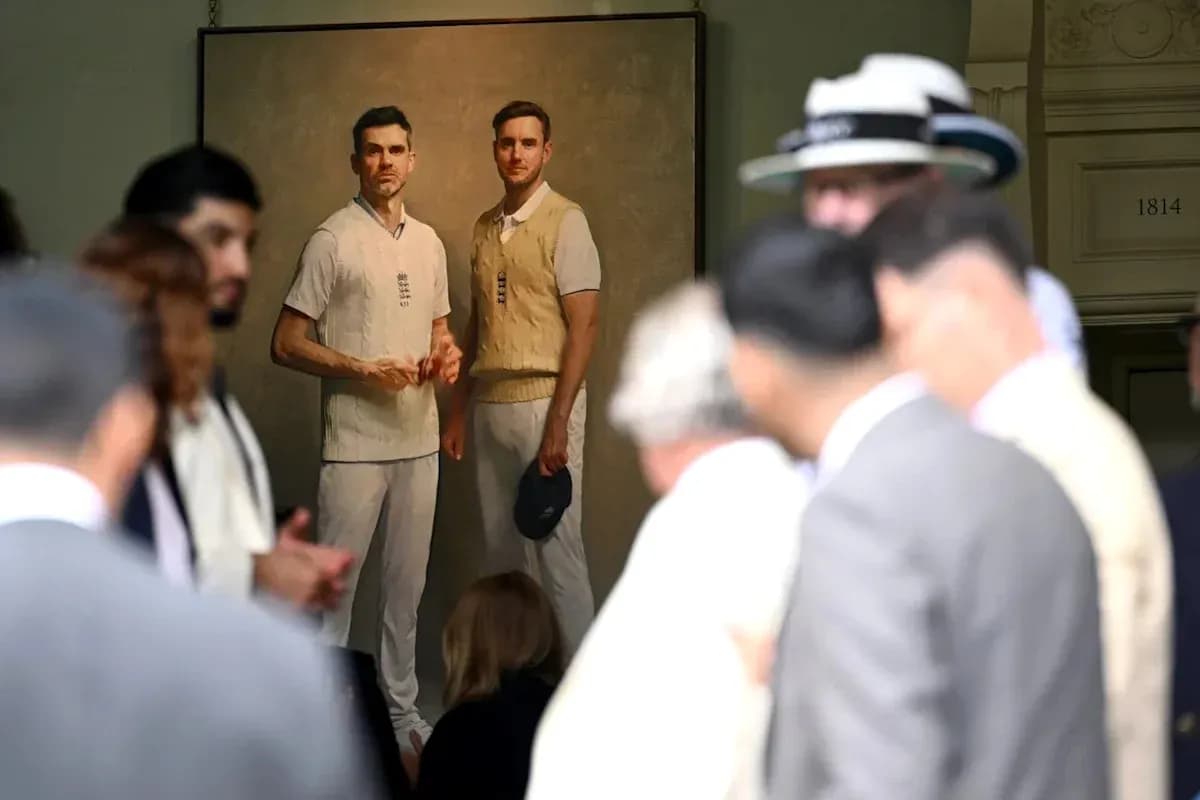 Portrait of two cricketers with crowd in foreground