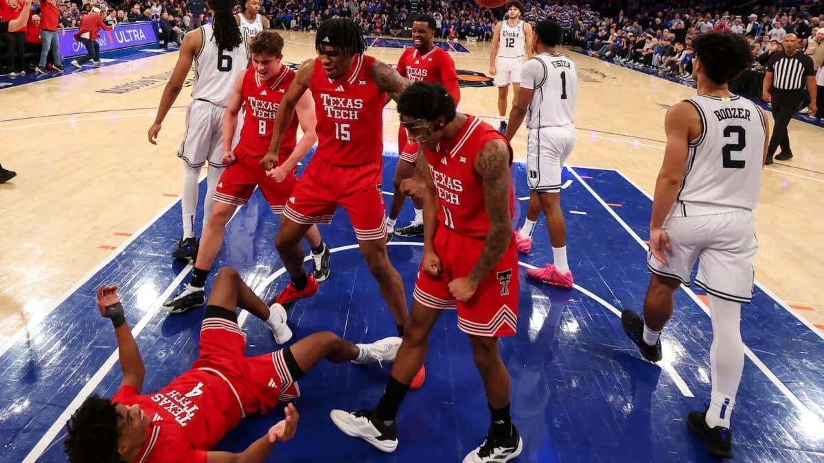 Texas Tech players celebrating after a play during game