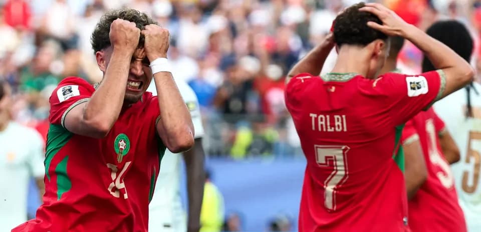 Moroccan players reacting after a missed opportunity