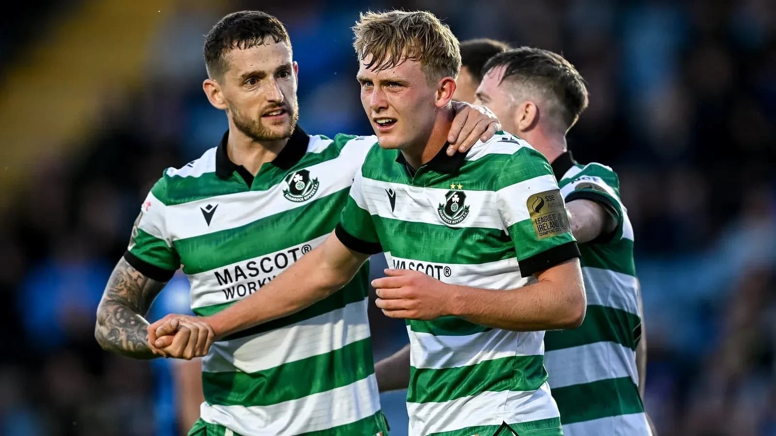 Hibernian players celebrating during a match