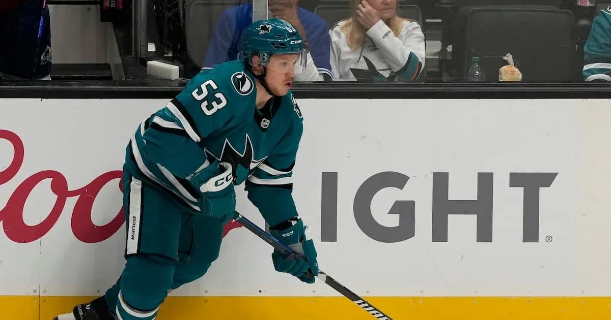 Hockey player skating near the bench during game