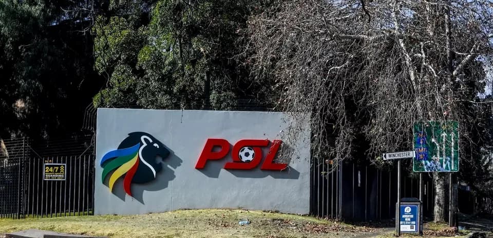 PSL logo on wall with surrounding trees