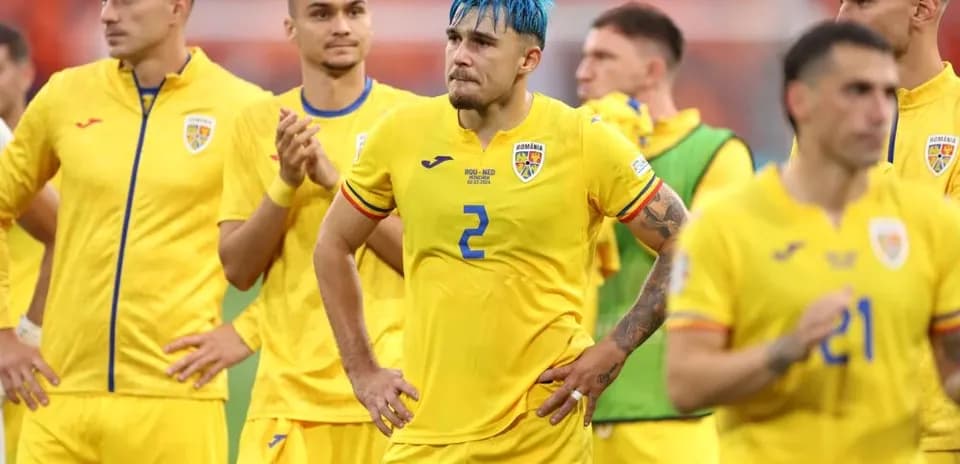 Romania team in yellow jerseys after match