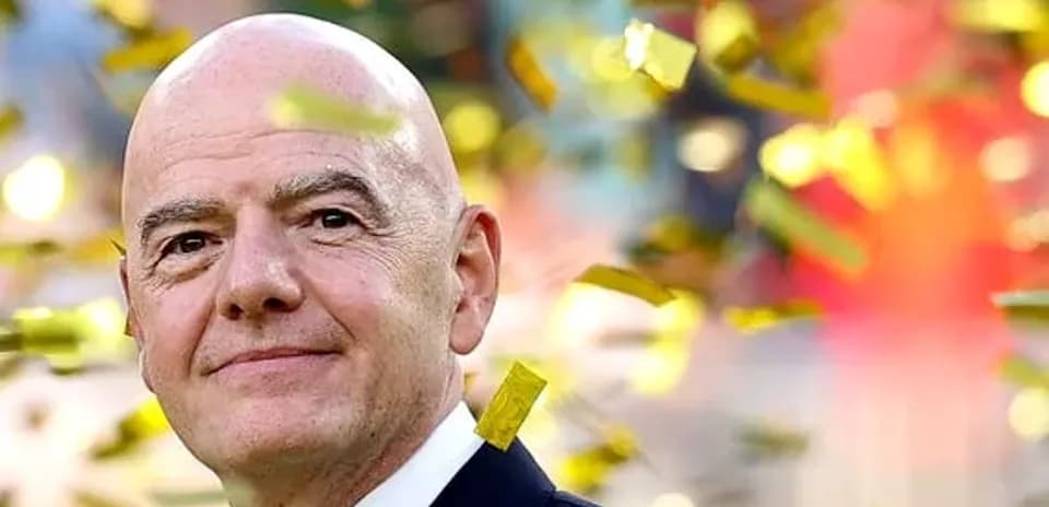 FIFA official surrounded by confetti during event