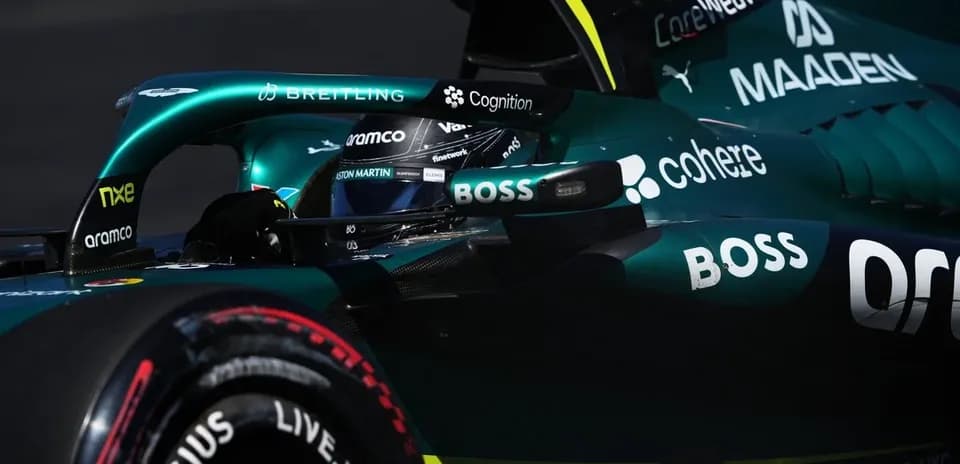 Formula 1 car during a race with driver visible