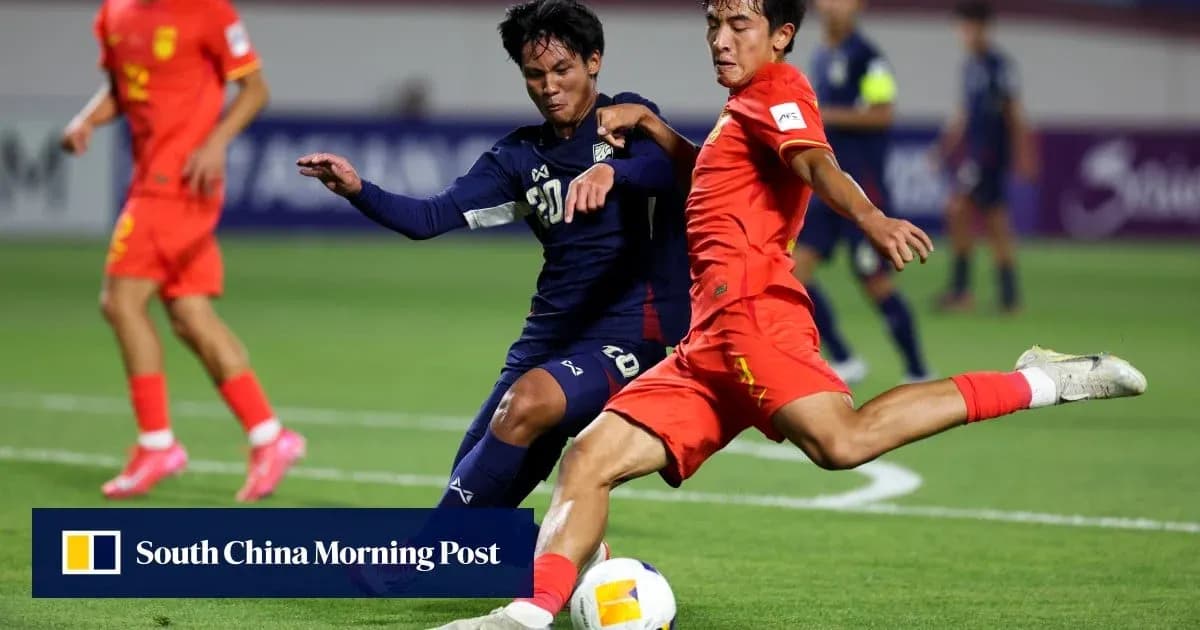 Two players challenging for the ball during match