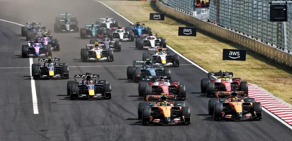 Formula 1 cars racing at the starting line