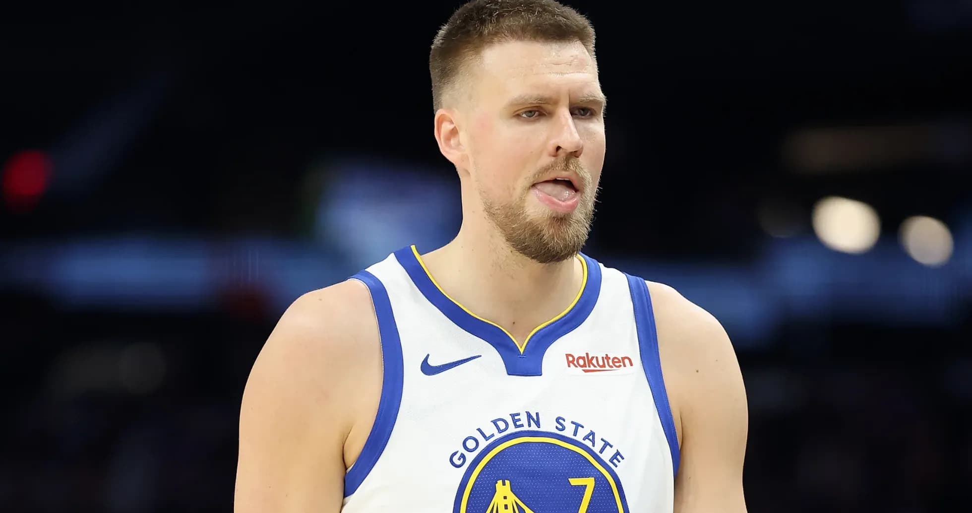 Basketball player in Golden State jersey during game