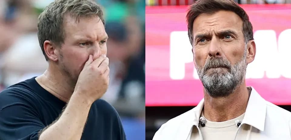 Two coaches observing the match during gameplay